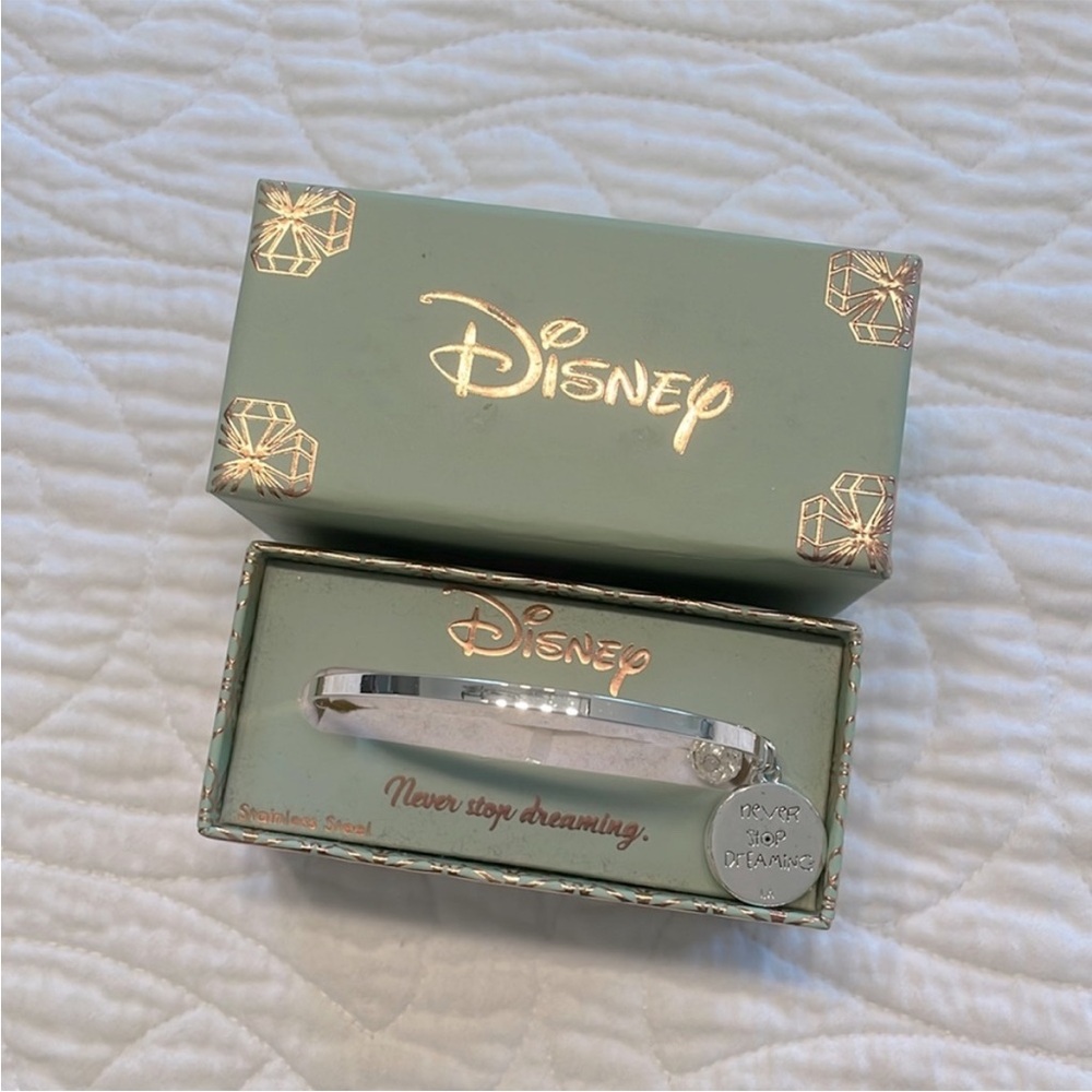 Official Disney silver-toned bracelet with Mickey Mouse charm. NWOT